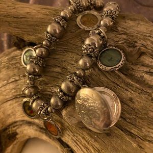 Bracelet with locket and charms